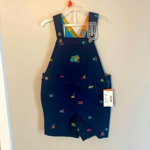 Precious shortalls with vehicles